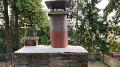 cape house with a metal chimney cap|unused chimney capping.